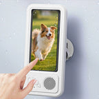 Waterproof cover with a speaker for your cell phone that hangs on your bathroom wall.